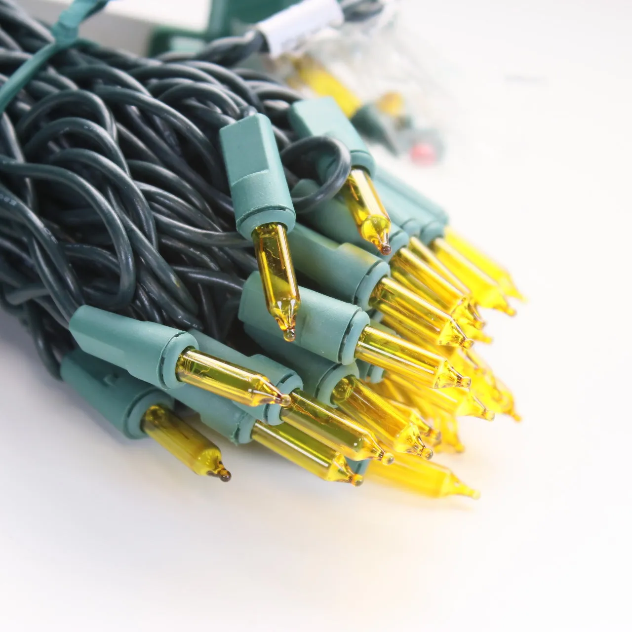 100-bulb Yellow Mini Lights, 4" Spacing, Green Wire