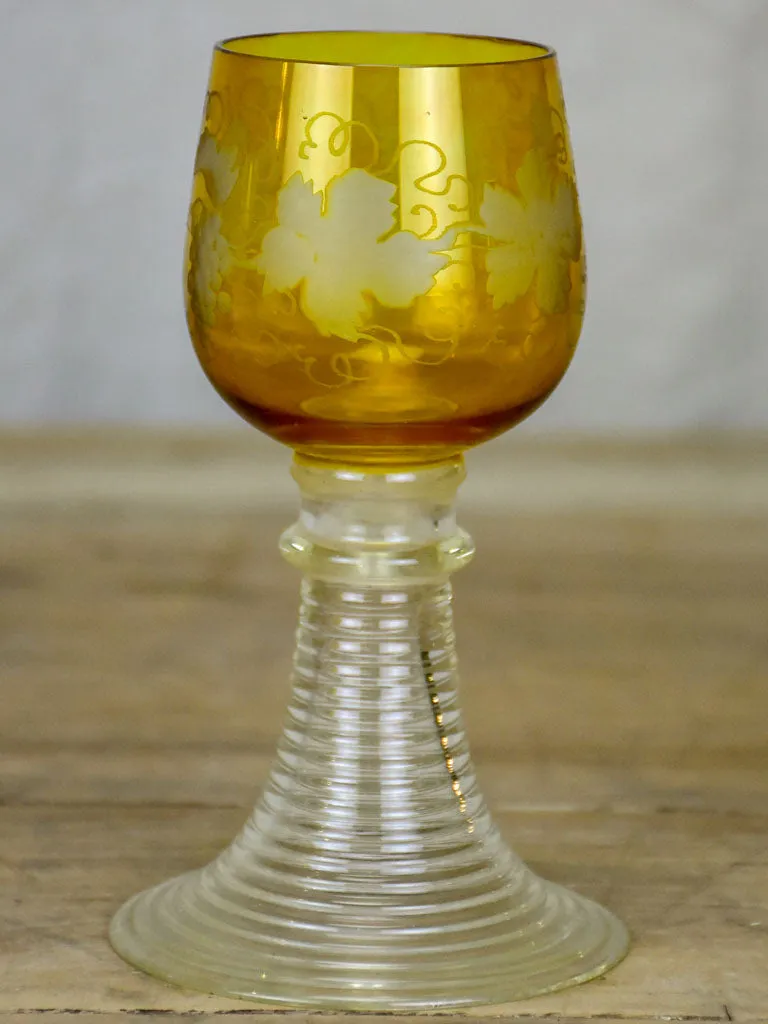 Six white wine glasses from Alsace with engraved decoration and broad ribbed bases