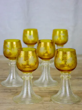 Six white wine glasses from Alsace with engraved decoration and broad ribbed bases